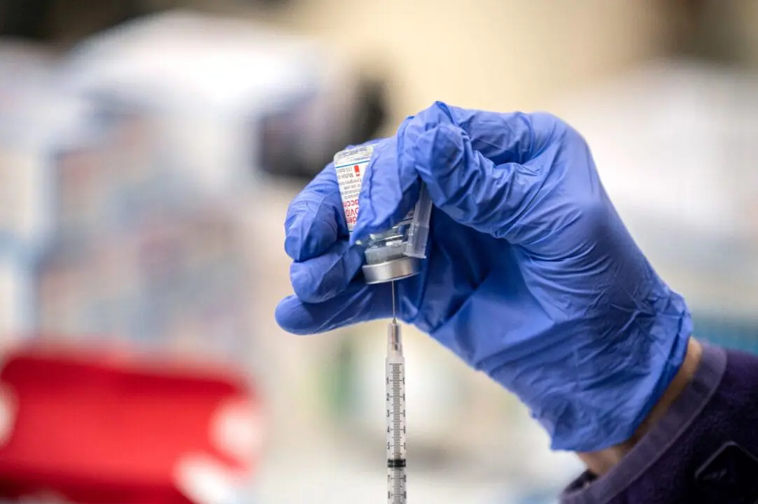 A nurse fills up a syringe with the Moderna Covid-19 vaccine in March 2021 in San Antonio, Texas. Vaccine maker Moderna announced on June 10 positive late-stage trial results for its Covid/flu combination vaccine it calls mRNA-1083. (Photo by Sergio Flores/Getty Images via CNN Newsource)