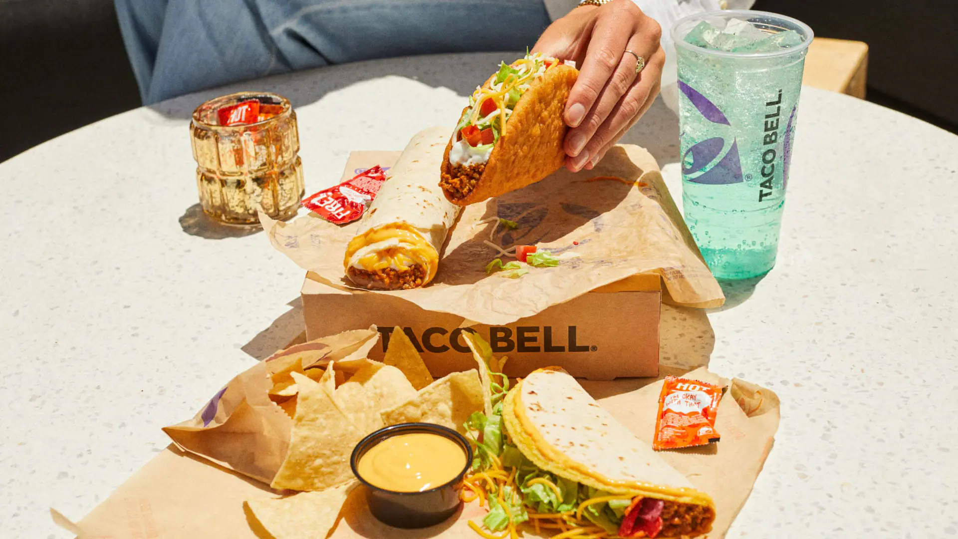 Taco Bell's new $7 Luxe Cravings Box includes a Chalupa Supreme, Beefy 5-Layer Burrito, Double Stacked Taco, chips and nacho cheese sauce, and a medium drink. The deal is only available for a limited time. (Provided Photo/Taco Bell Corp.)