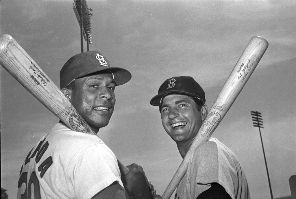 FILE - St. Louis Cardinals' Orlando Cepeda, left, and Boston Red Sox's Carl Yastrzemski pose for a photo in March 1968 in St. Petersburg, Fla. Cepeda, the slugging first baseman nicknamed “Baby Bull” who became a Hall of Famer among the early Puerto Ricans to star in the major leagues, has died. He was 86. The San Francisco Giants and his family announced the death Friday night, June 28, 2024, and a moment of silence was held on the scoreboard at Oracle Park midway through a game against the Los Angeles Dodgers.