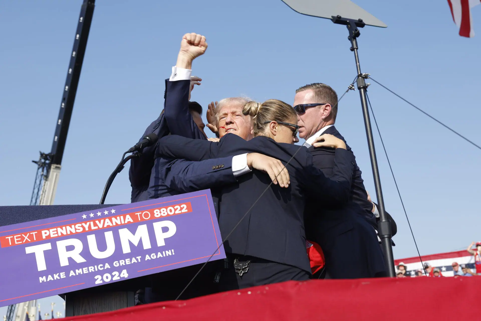 BUTLER, PENNSYLVANIA - JULY 13: Republican presidential candidate former President Donald Trump is rushed offstage during a rally on July 13, 2024 in Butler, Pennsylvania. (Photo by Anna Moneymaker/Getty Images)