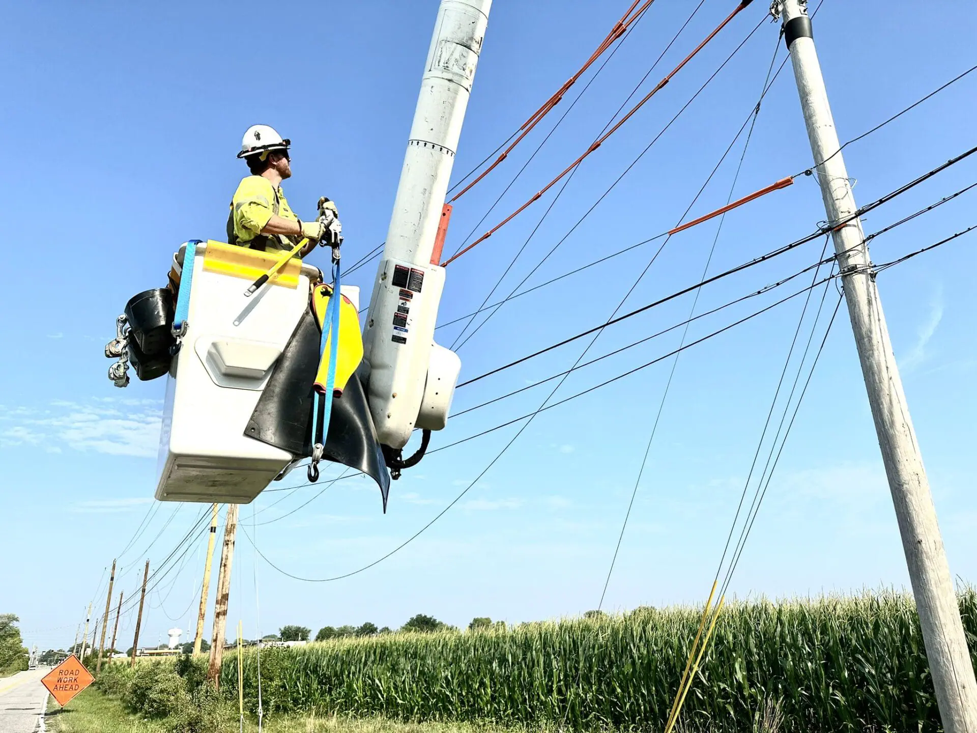 An AES Indiana worker does general maintenance on the southeast side of Indianapolis in July 2023. AES says it expects a full restoration of power after remnants of Hurricane Helene left thousands in Indiana without power, some being left in the dark for several days. (Photo by AES Indiana)