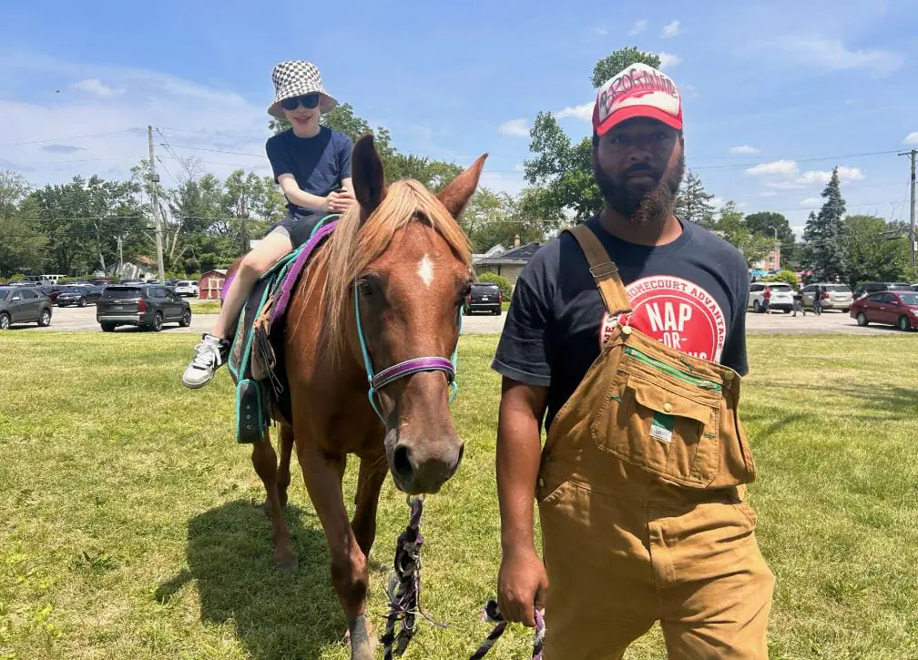 The petting zoo allowed children to play with farm animals and ride horses. (WISH Photo/Brittany Noble)