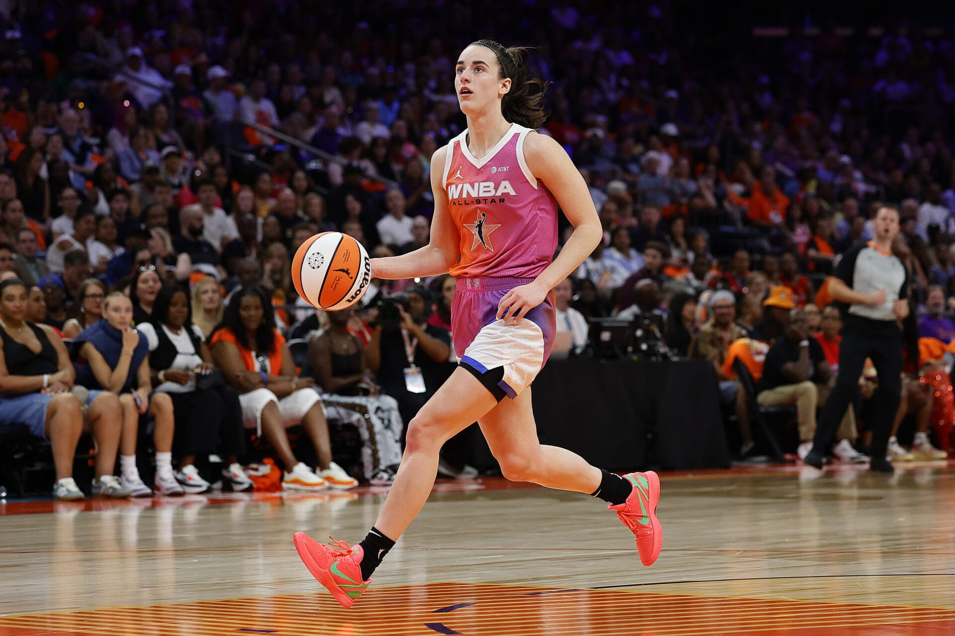 Caitlin Clark #22 of Team WNBA drives down the court during the second quarter of the 2024 WNBA All Star Game at Footprint Center on July 20, 2024 in Phoenix, Arizona. (Photo by Alex Slitz/Getty Images)