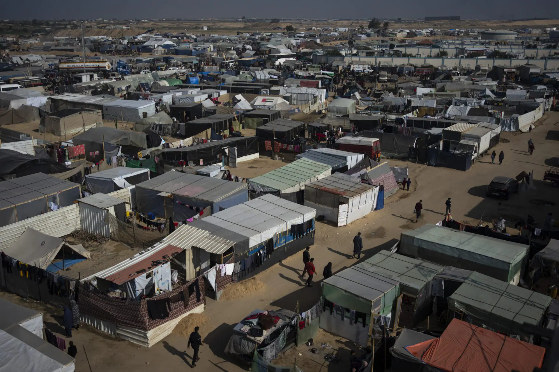 A view of the makeshift tent camp where Palestinians displaced by the Israeli bombardment of the Gaza Strip are staying, in the Muwasi area, southern Gaza, Jan. 1, 2024. The Israeli military ordered Monday, July 22, the evacuation of part of the area of the Gaza Strip, which they had designated a humanitarian zone. (AP Photo/Fatima Shbair, File)