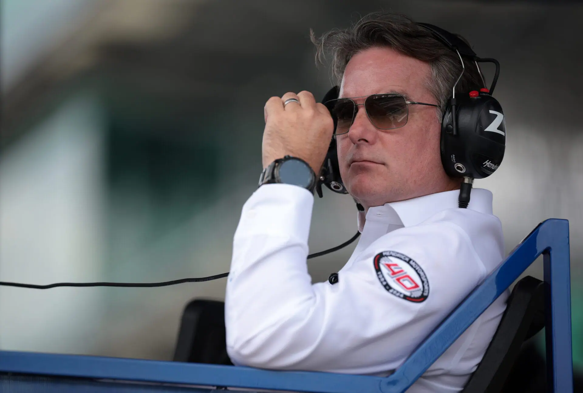 Five-time Brickyard 400 winner Jeff Gordon, now vice chairman of Hendrick Motorsports, watches the 2024 Brickyard 400 at Indianapolis Motor Speedway on July 22, 2024. (Photo by James Gilbert/Getty Images)