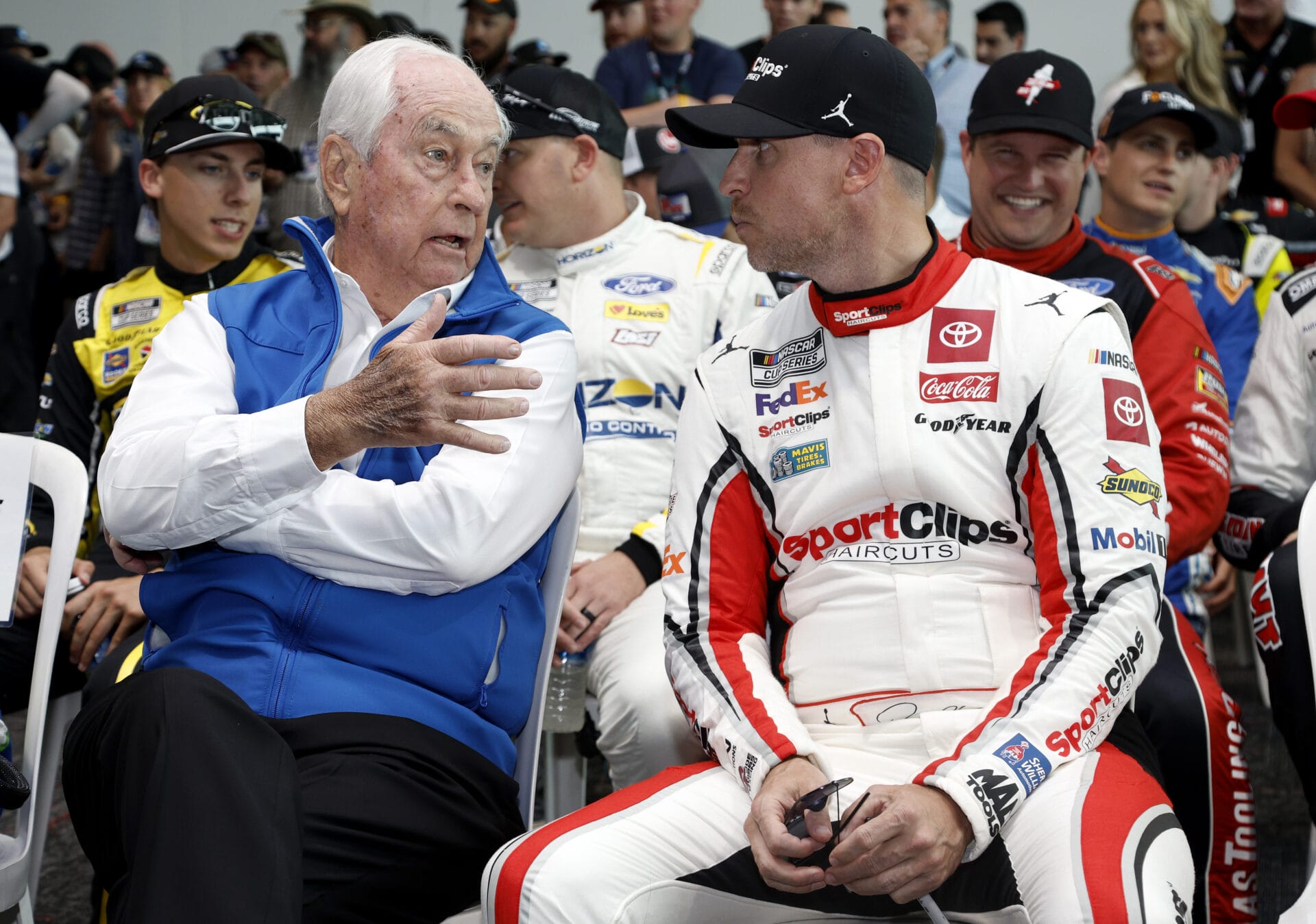 Indianapolis Motor Speedway and NASCAR Cup Series team owner Roger Penske chats with Denny Hamlin, driver of the #11 Sport Clips Haircuts Toyota, before the Brickyard 400 at Indianapolis Motor Speedway on July 21, 2024. (Photo by Sean Gardner/Getty Images)