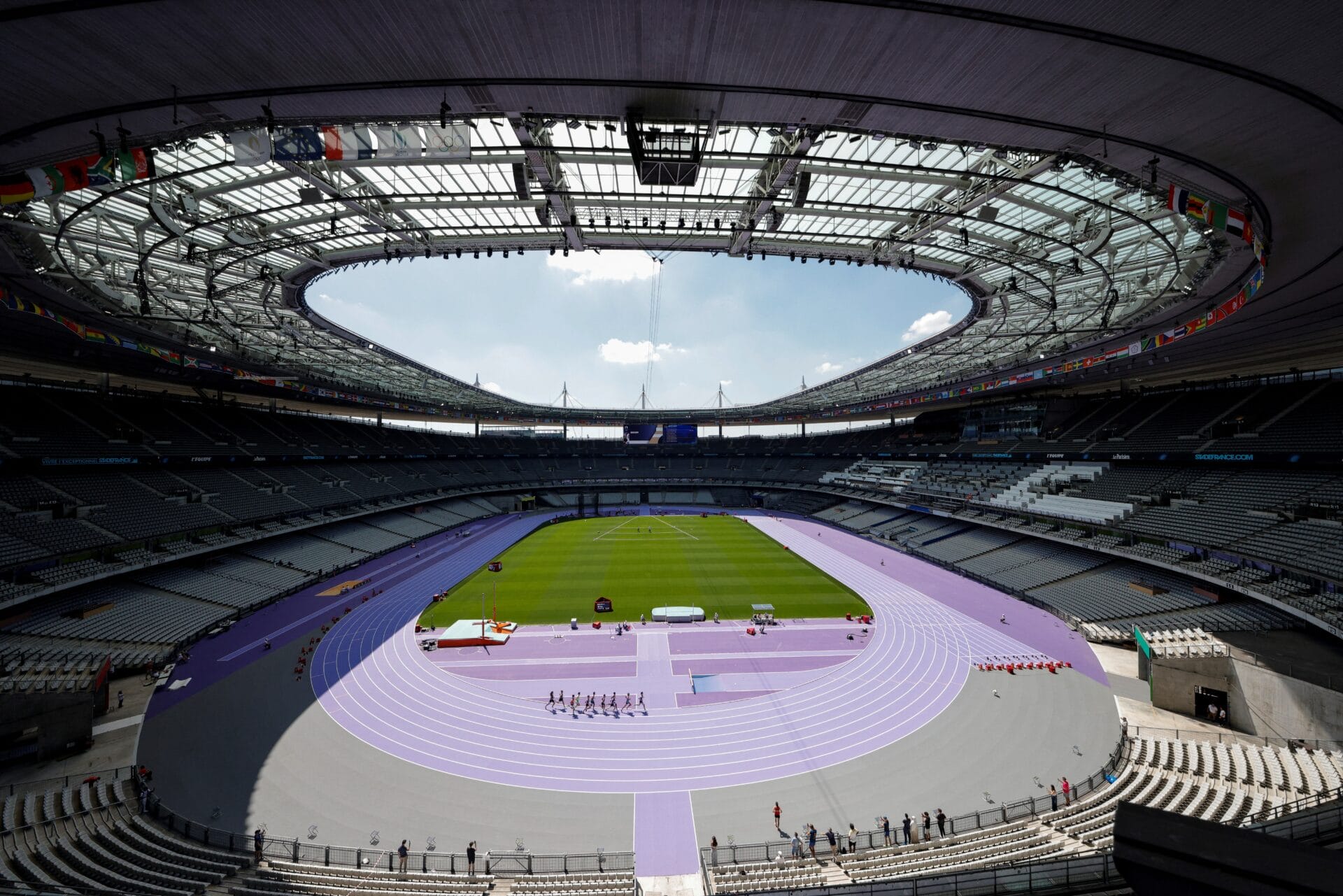 Regional athletes compete during a test event for the Olympics Games at the Stade de France, in Saint-Denis on June 25, 2024. The Stade de France will host track and field events and Rugby sevens game during the Paris 2024 Olympic Games. (Photo by GEOFFROY VAN DER HASSELT/AFP via Getty Images)