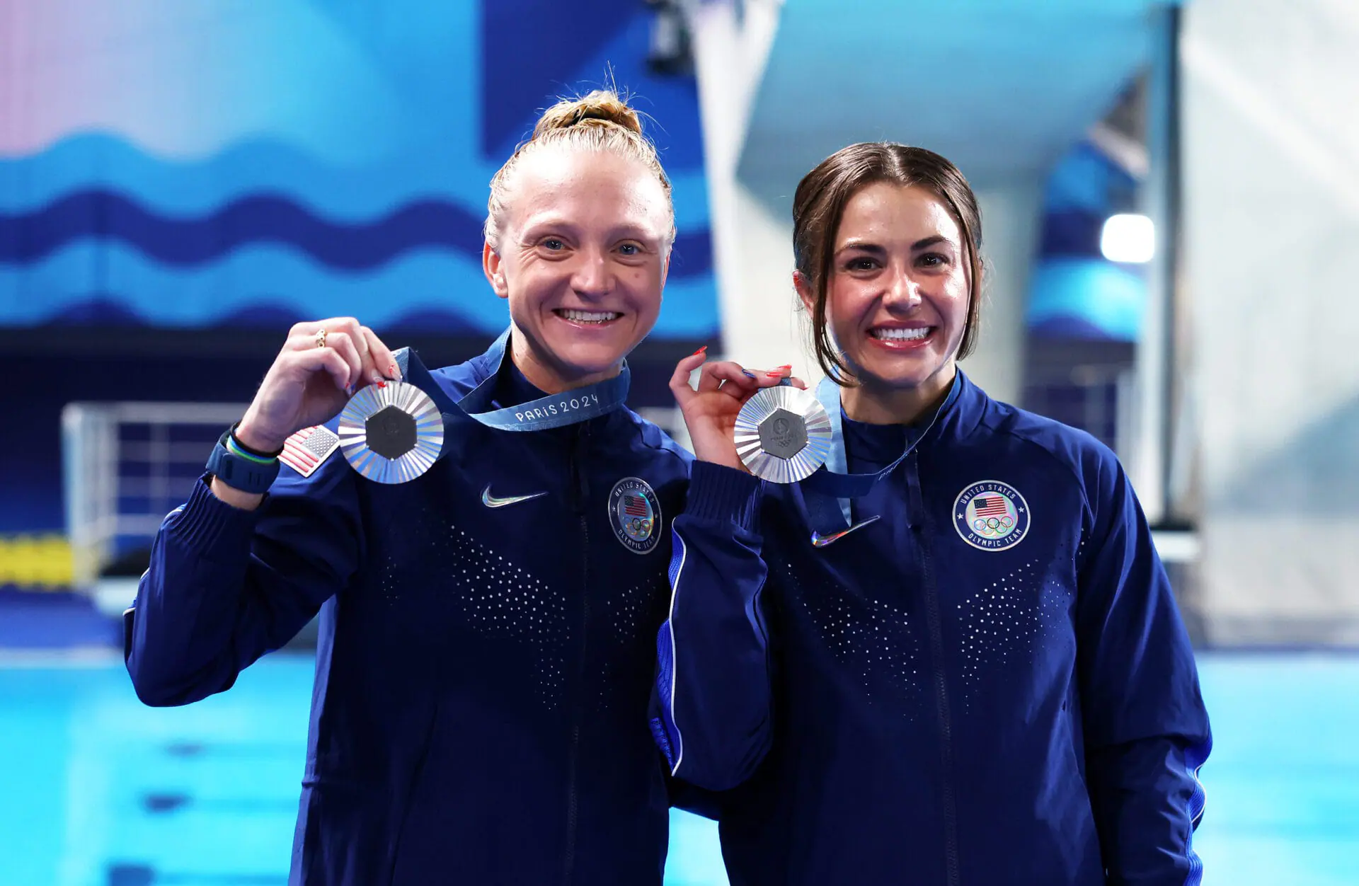 PARIS, FRANCE - JULY 27: Silver Medalists, Sarah Bacon and Kassidy Cook of Team United States pose with their medals after the Medal Ceremony after competing in the Women's Synchronised 3m Springboard Final on day one of the Olympic Games Paris 2024 at Aquatics Centre on July 27, 2024 in Paris, France. (Photo by Sarah Stier/Getty Images)