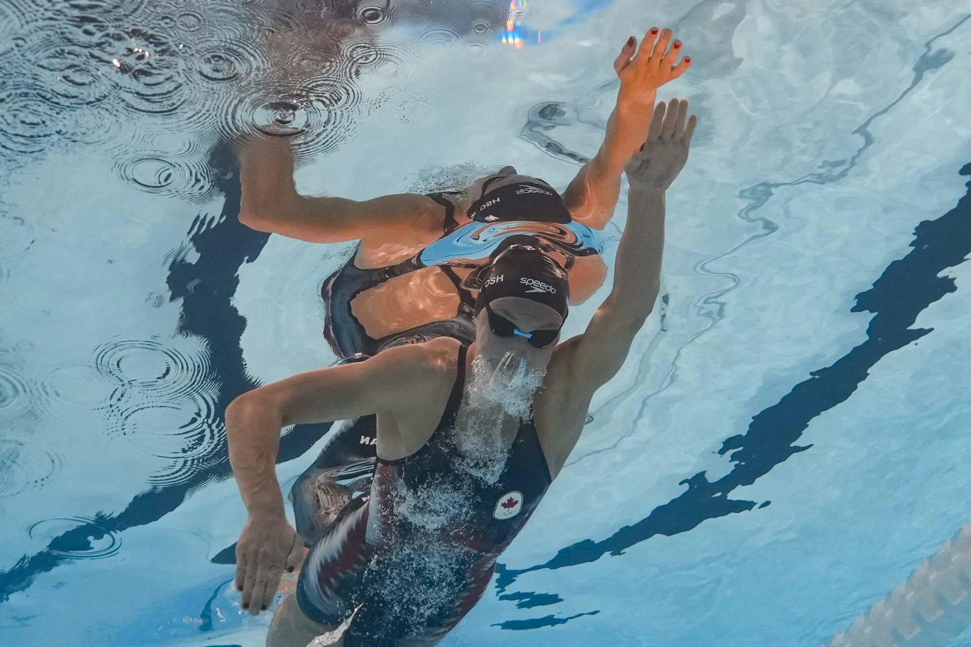 Summer McIntosh, of Canada, competes during a heat in the women's 400-meter freestyle at the 2024 Summer Olympics, Saturday, July 27, 2024, in Nanterre, France. (AP Photo/David J. Phillip)