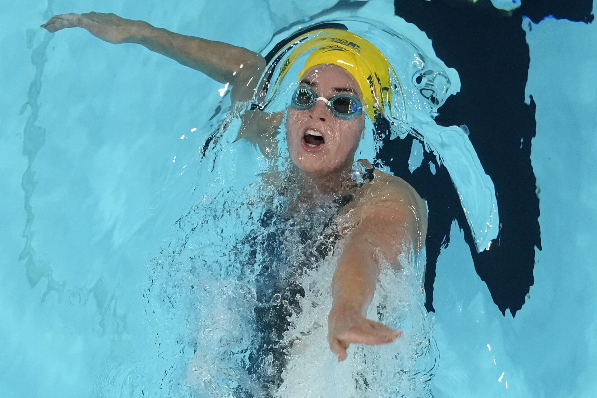 Kaylee McKeown, of Australia, competes during a heat in the women's 100-meter backstroke at the 2024 Summer Olympics, Monday, July 29, 2024, in Nanterre, France. (AP Photo/David J. Phillip)