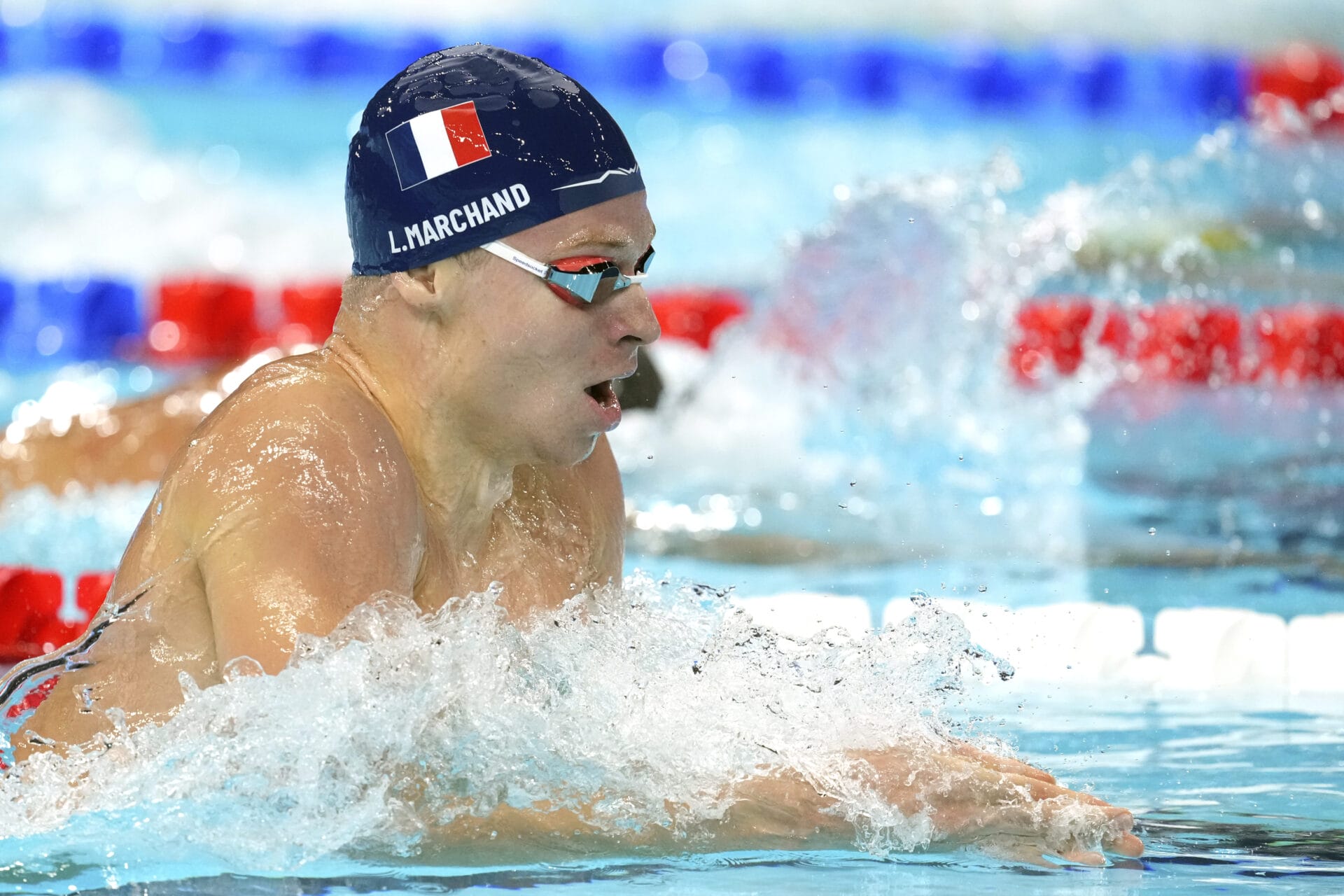 Leon Marchand, of France, competes in the men's 200-meter individual medley at the 2024 Summer Olympics, Thursday, Aug. 1, 2024, in Nanterre, France. (AP Photo/Ashley Landis)