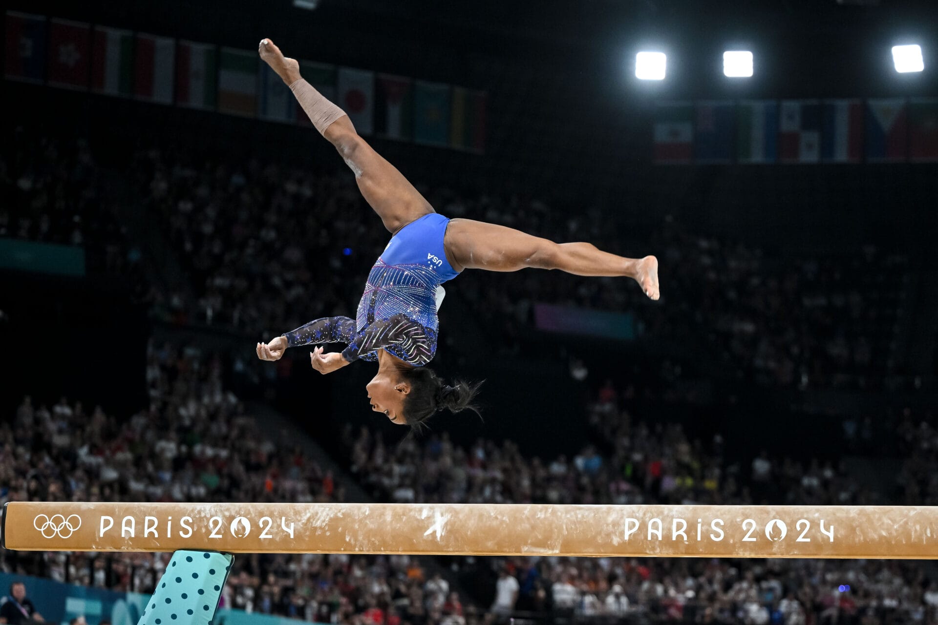 Simone Biles of USA competes during the women's Artistic Gymnastics All-Around Final - on Balance Beam on Day 6 of the Olympic Games Paris 2024 at Bercy Arena on August 1, 2024 in Paris, France. (Photo by Harry Langer/DeFodi Images via Getty Images)