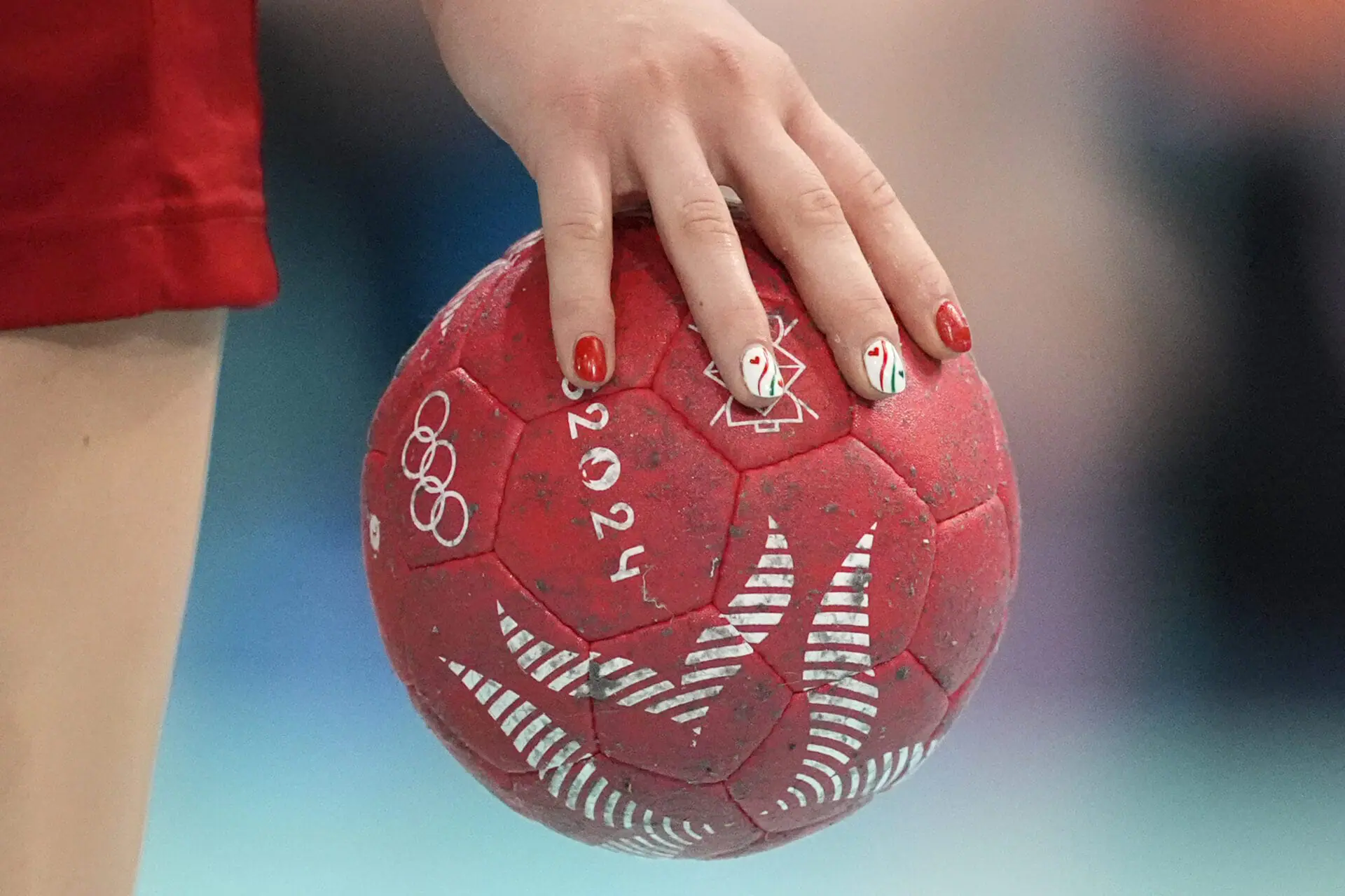 Tovizi Petra Anita Fuezi, of Hungary, holds the ball during a women's handball match against Netherlands at the 2024 Summer Olympics, Saturday, Aug. 3, 2024, in Paris, France. (AP Photo/Aaron Favila)