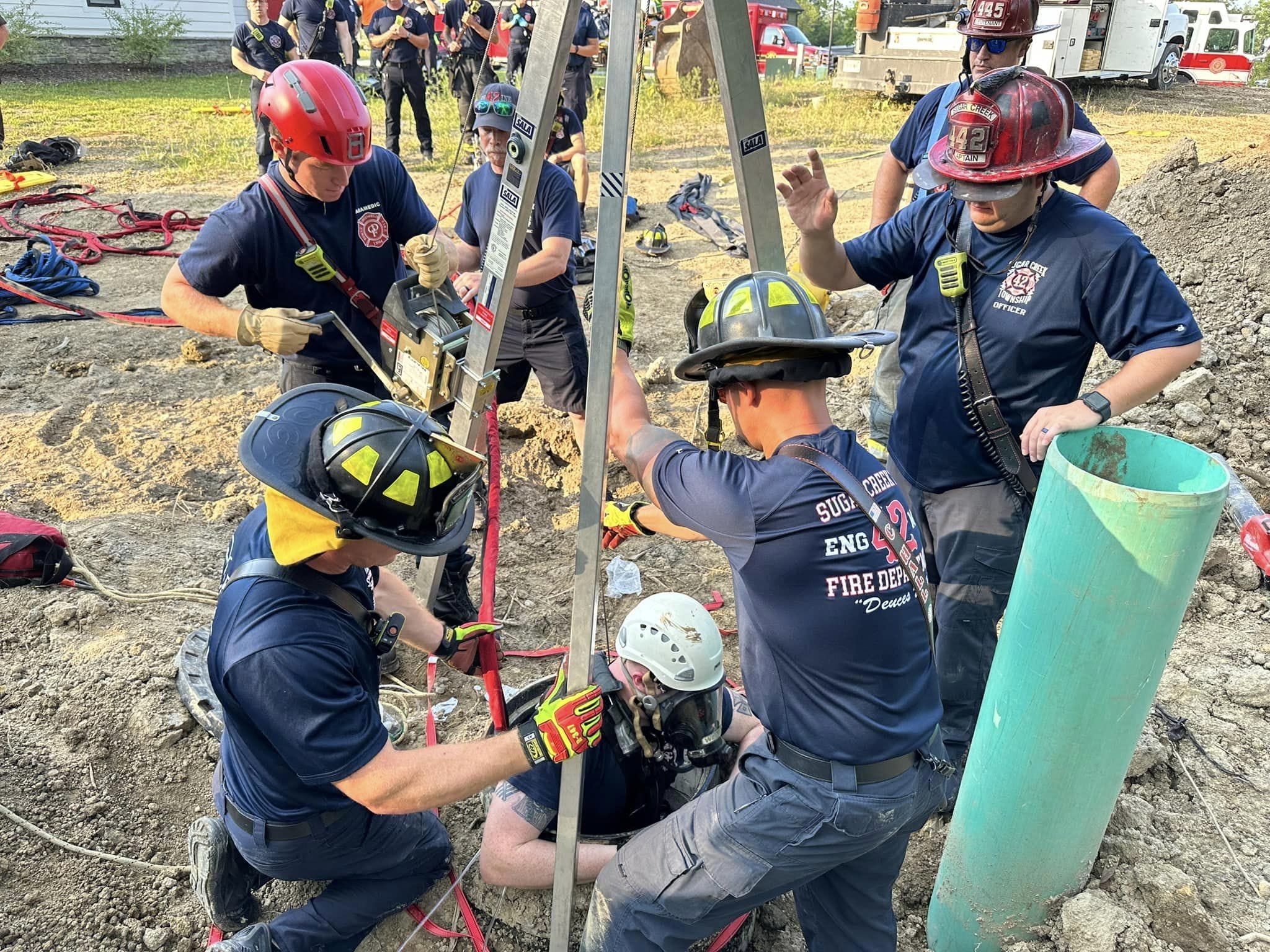 3 workers rescued from manhole in Greenfield