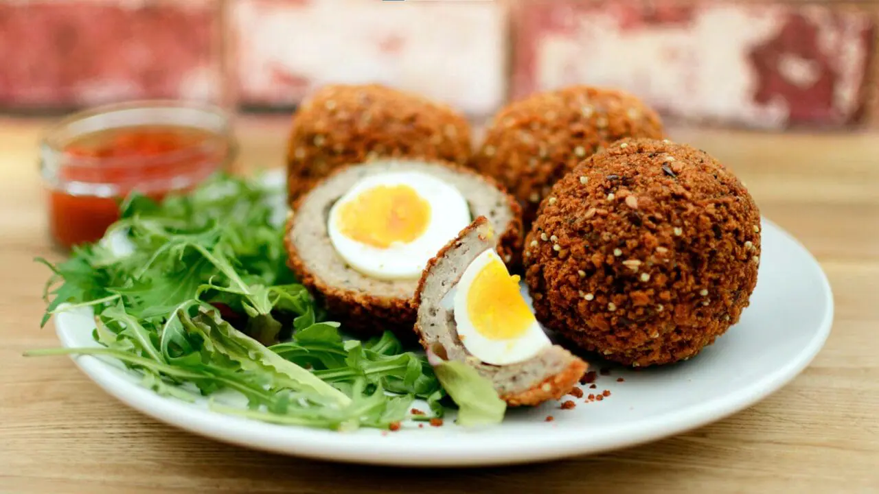 scotch eggs recipe cooked and plated