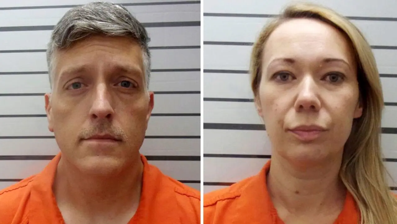 Jon Hallford, left, and Carie Hallford, owned the Colorado funeral home and obtained nearly $900,000 in pandemic relief funds that they allegedly used for personal expenses. (Provided Photo/Muskogee County Sheriff's Office/AP via CNN)