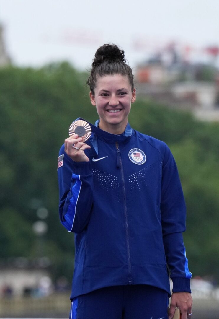 Bronze medalist Chloe Dygert of the United States shows her medal during the medal ceremony for Women's Individual Time Trial of Cycling Road at the Paris 2024 Olympic Games in Paris, France, on July 27, 2024. (Photo by Li Yibo/Xinhua via Getty Images)