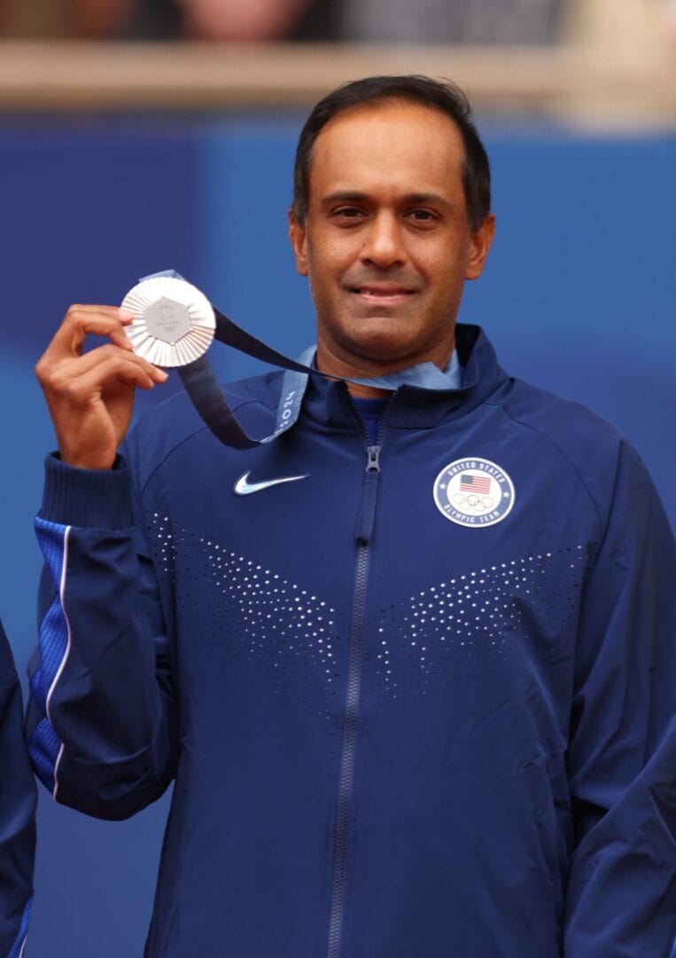 Silver medallists Rajeev Ram of Team United States pose on the podium during the Tennis Men's Doubles medal ceremony after the Tennis Men's Doubles matches on day eight of the Olympic Games Paris 2024 at Roland Garros on August 03, 2024 in Paris, France. (Photo by Tnani Badreddine/DeFodi Images via Getty Images)