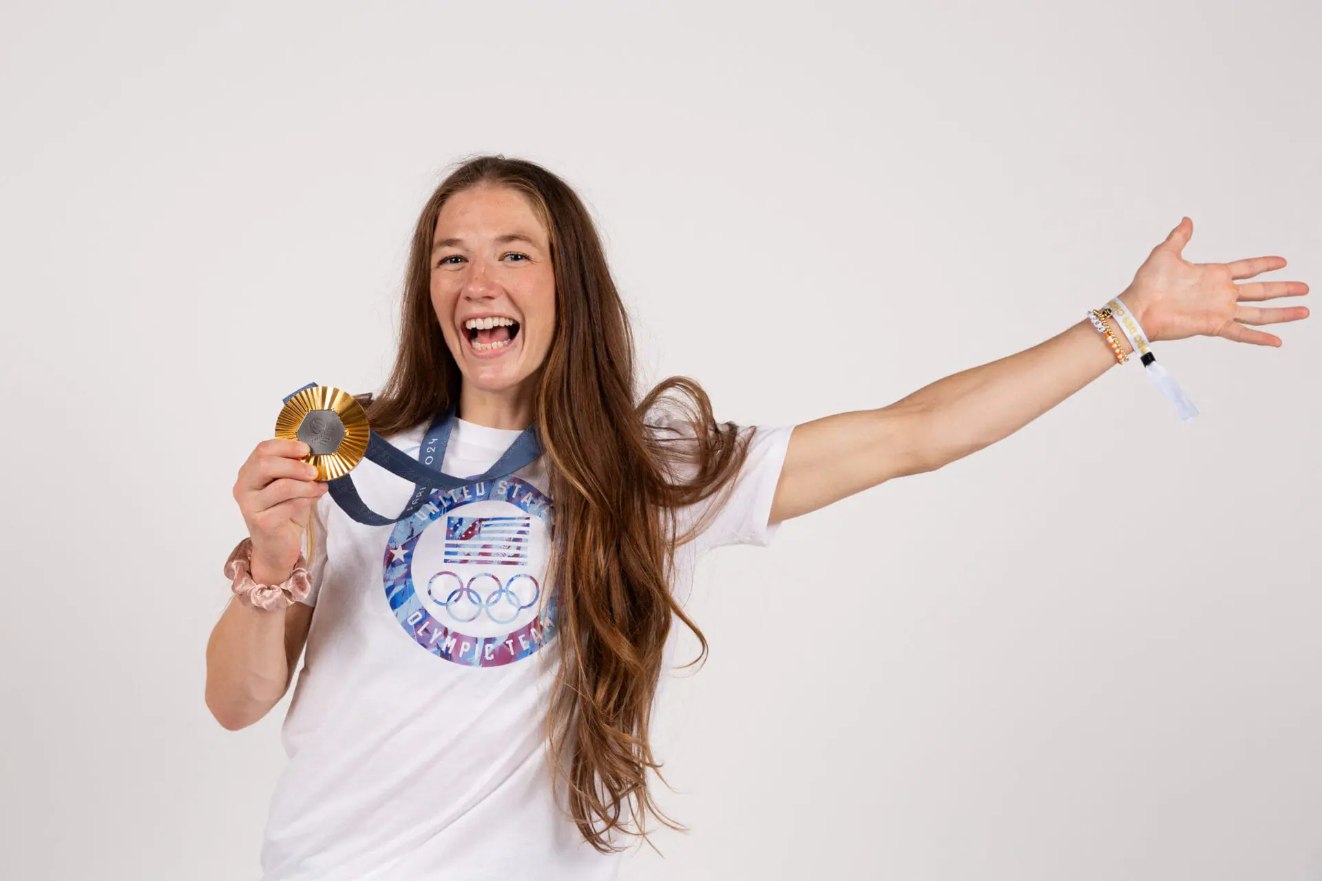 US women's wrestling freestyle 50kg gold medallist, Sarah Hildebrandt, poses for a portrait during a photo session at the Champions Park at Trocadero in Paris on August 8, 2024 during the Paris 2024 Olympic Games. (Photo by THIBAUD MORITZ / POOL / AFP) (Photo by THIBAUD MORITZ/POOL/AFP via Getty Images)