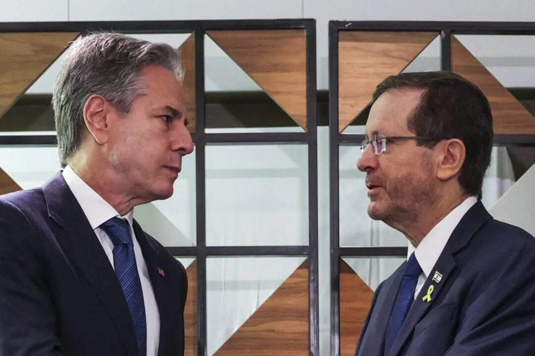 U.S. Secretary of State Antony Blinken, left, meets with Israel's President Isaac Herzog, in Tel Aviv, Israel, Monday, Aug. 19, 2024. (Kevin Mohatt/Pool Photo via AP)