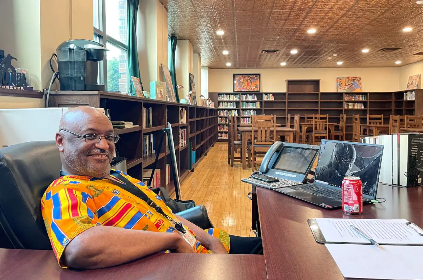 Maurice Broaddus, librarian at The Oaks Academy middle school, poses for a portrait during orientation last week. The award-winning author is helping revive the historic Paul Laurence Dunbar Library, which in 1922 was the first library in Indianapolis established specifically to serve Black residents.