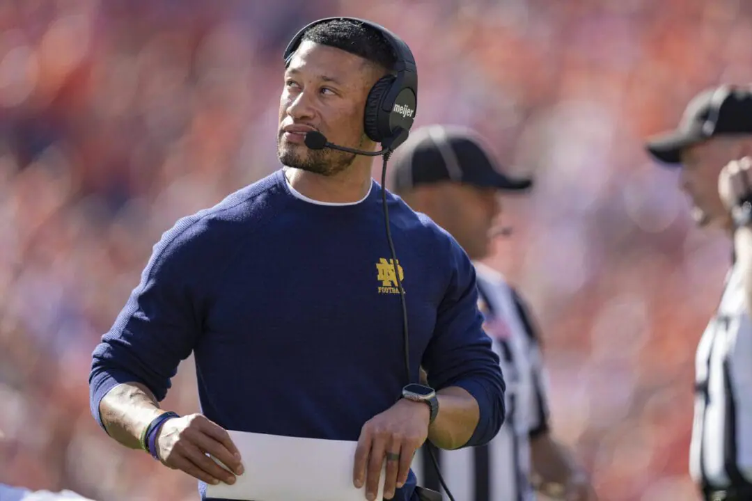 FILE - Notre Dame head coach Marcus Freeman looks on against Clemson during an NCAA college football game, Nov. 4, 2023, in Clemson, S.C. Freeman's new QB, Riley Leonard, a transfer from Duke, is expected to make his Notre Dame debut Aug. 31 at No. 20 Texas A&M. (AP Photo/Jacob Kupferman, File)