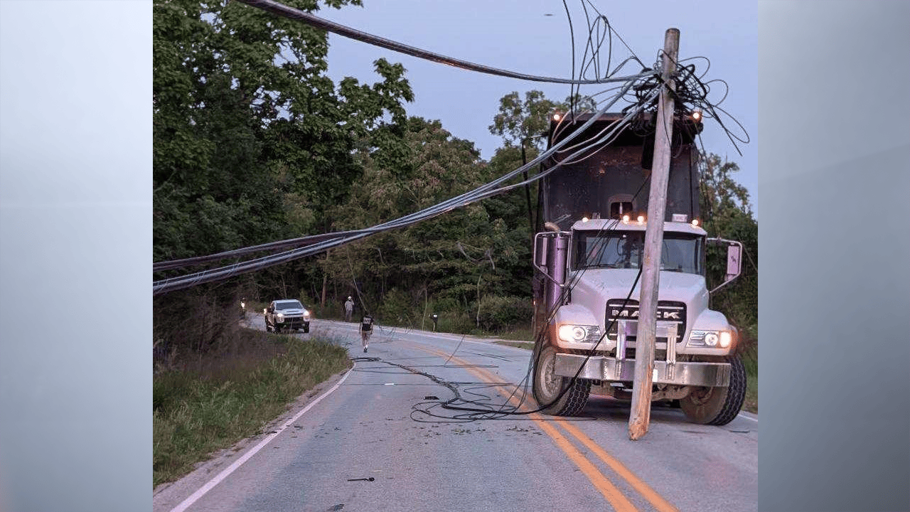 A dump truck knocked out several utility poles and power lines while driving along State Road 62 in southern Indiana. (Provided Photo/Indiana State Police Sellersburg District)