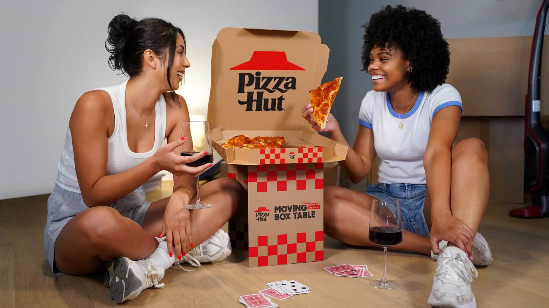 Pizza Hut unveils the moving box table: specialty pizza boxes that turn into a miniature table for moving day. (Provided Photo/Handout/Pizza Hut via CNN Newsource)