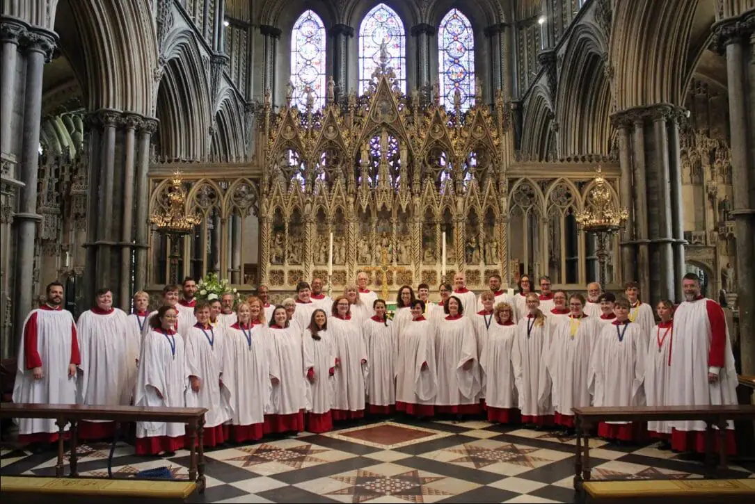 Choristers from St. Paul’s Indianapolis Episcopal Church pose for a photo in Ely Cathedral near Cambridge, England. (Provided Photo/Margaret Thuesen via Mirror Indy)