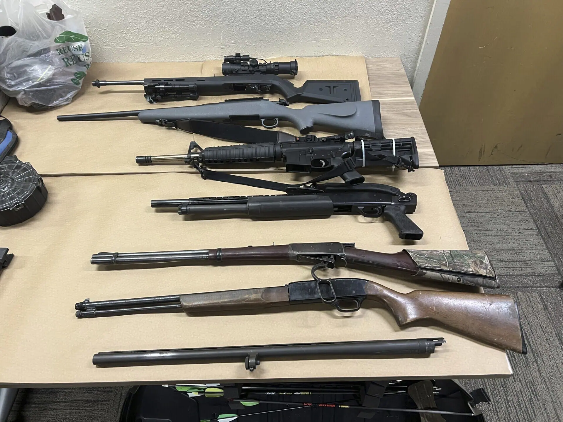 This photo provided by the Monterey County Sheriff's Office on Friday, Sept. 6, 2024, shows some of the weapons confiscated from the Prunedale, Calif., home of Vicente Arroyo, suspected killing dozens of animals. (Monterey County Sheriff's Office via AP)