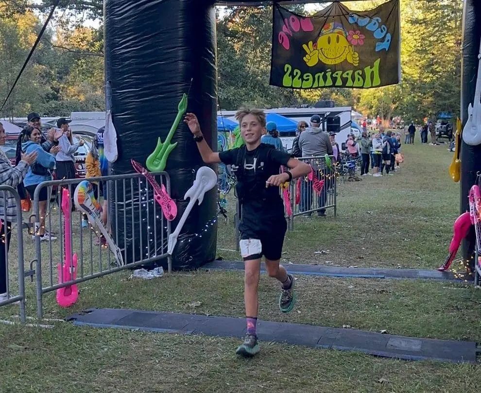 12-year-old Gabriel Abbott crosses the finish line at the Run Woodstock race on Sept. 7, 2024. (Provided Photo/Stephanie Abbott)