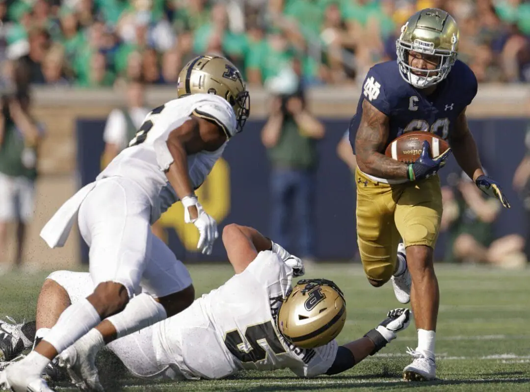 Kyren Williams #23 of the Notre Dame Fighting Irish runs the ball during the game against the Purdue Boilermakers at Notre Dame Stadium on September 18, 2021. The two teams will meet this weekend for the first time in three years. (Photo by Michael Hickey/Getty Images)