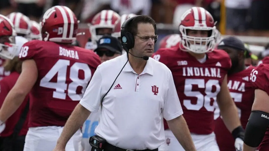 Indiana head coach Curt Cignetti, center, watches the first half of an NCAA college football game against Florida International, Saturday, Aug. 31, 2024, in Bloomington, Ind. (AP Photo/Darron Cummings)