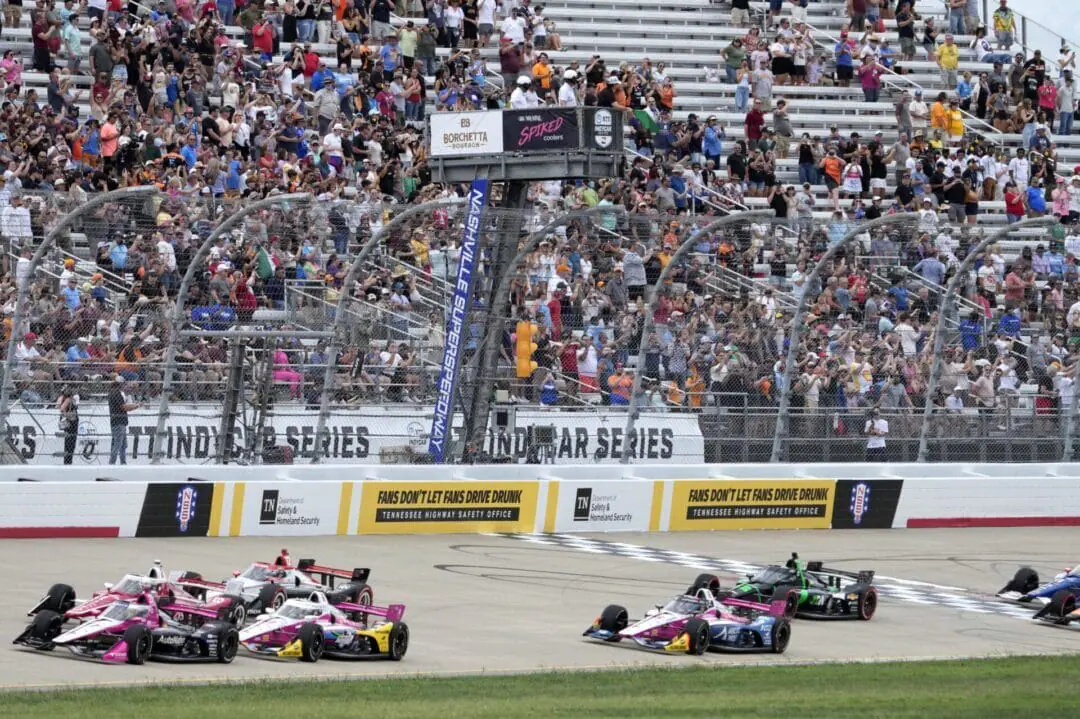 Drives pass under the green flag as they start an IndyCar auto race Sunday, Sept. 15, 2024, at Nashville Superspeedway in Lebanon, Tenn. (AP Photo/Mark Humphrey)