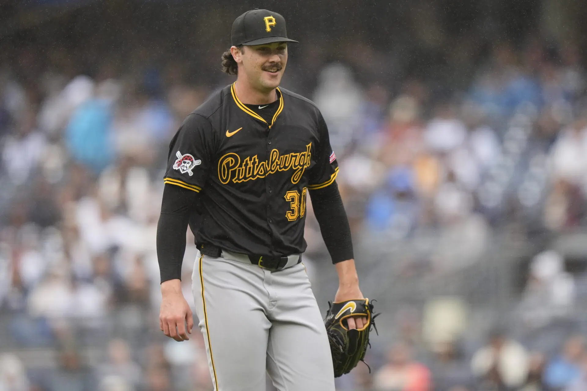 Pittsburgh Pirates' Paul Skenes smiles after the second inning of a baseball game against the New York Yankees, Saturday, Sept. 28, 2024, in New York.