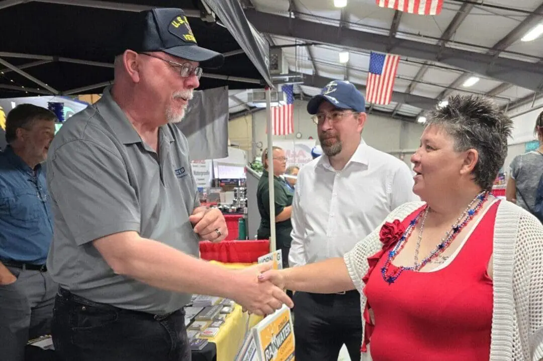 Libertarian gubernatorial candidate Donald Rainwater talks with supporters. In 2020, the candidate netted more than 11% of the vote — and he thinks he can win it all in 2024. (Provided Photo/Rainwater for Indiana Campaign)