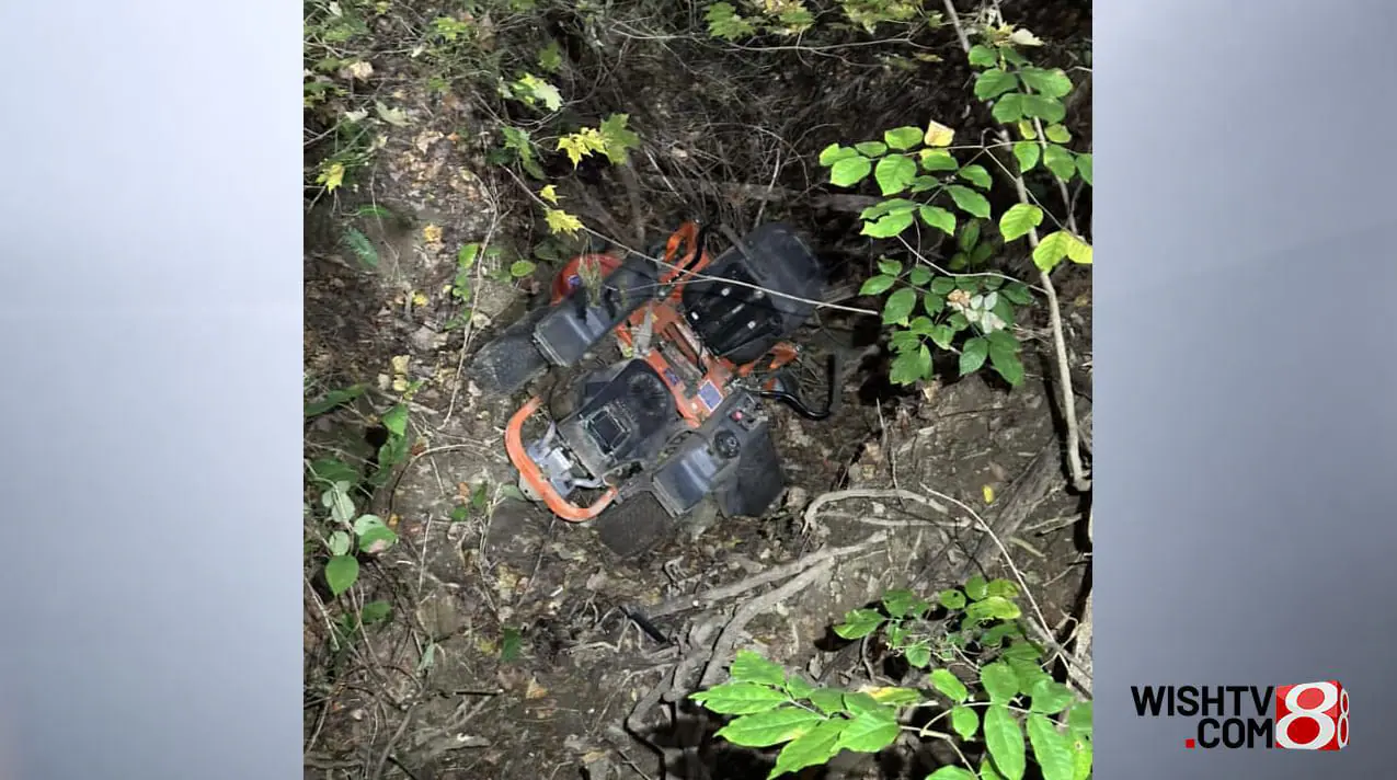 Firefighters in Johnson County say they rescued a male who'd been trapped under a lawn mower for almost an hour deep in a ravine near Trafalgar. (Provided Photo/Trafalgar Fire Department)