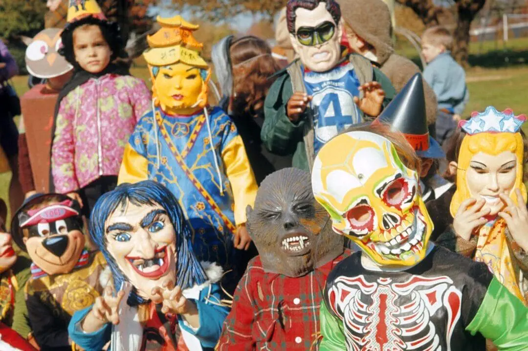 1970s Group Of Neighborhood Kids Boys And Girls In Halloween Costumes And Masks . (Photo by H. Armstrong Roberts/ClassicStock/Getty Images)