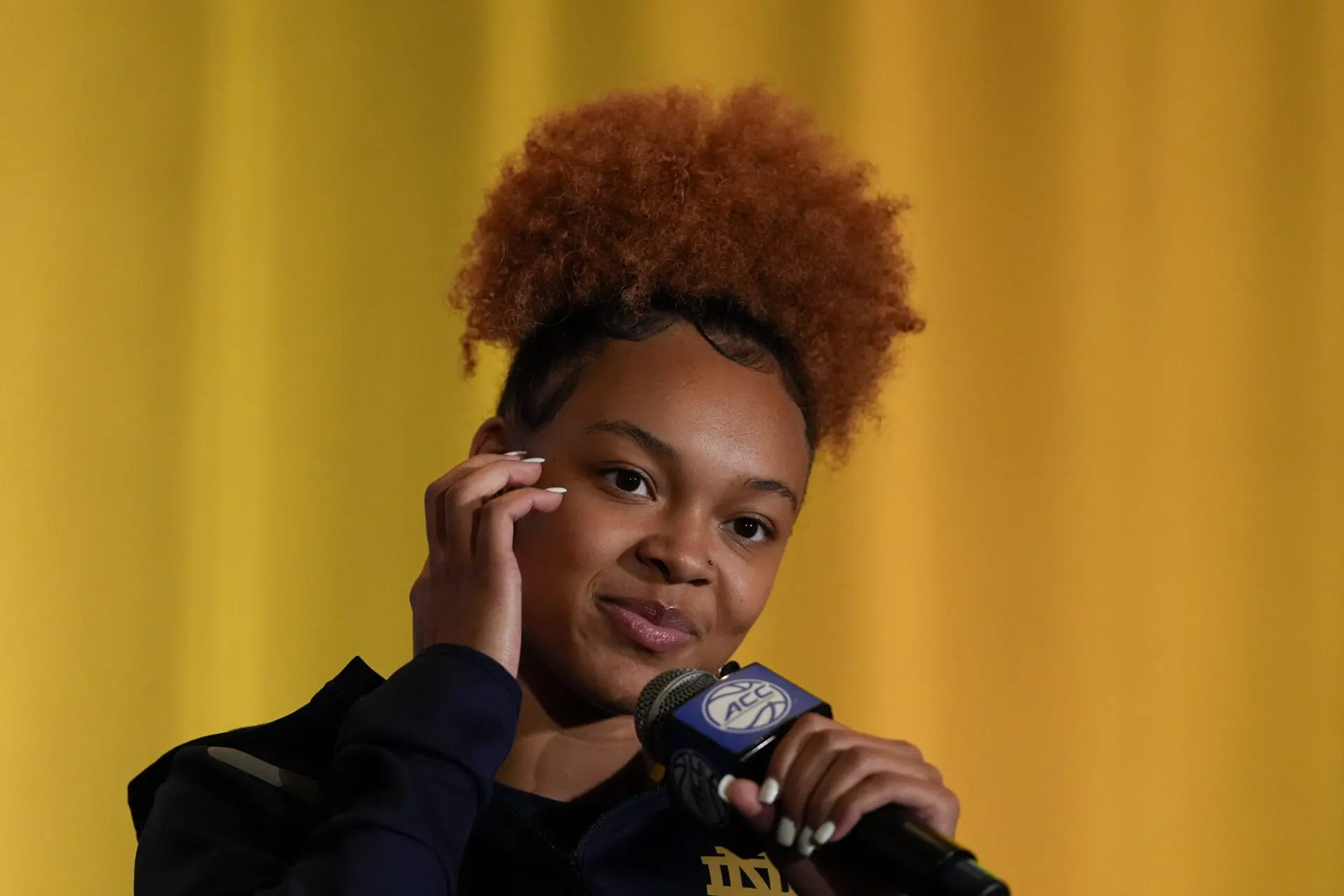 Notre Dame guard Hannah Hidalgo speaks during a ACC women's NCAA college basketball media day, Tuesday, Oct. 8, 2024, in Charlotte, N.C. (AP Photo/Chris Carlson)