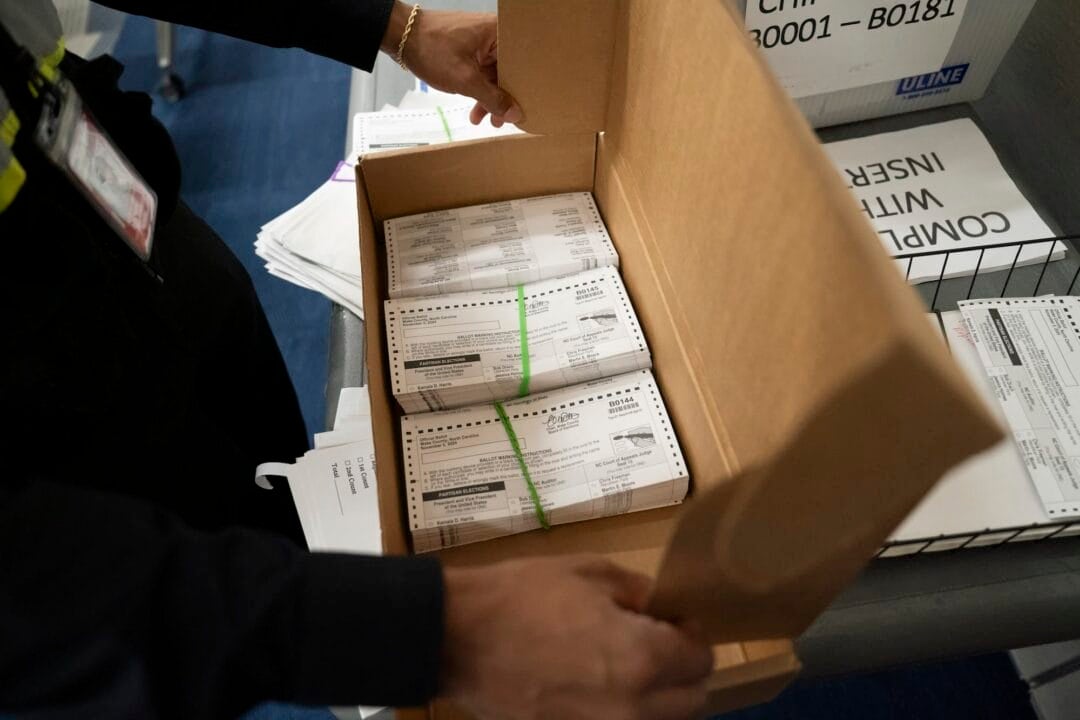 Absentee ballots are prepared to be mailed at the Wake County Board of Elections on September 17, 2024, in Raleigh, North Carolina. (Photo by Allison Joyce/Getty Images via CNN Newsource)