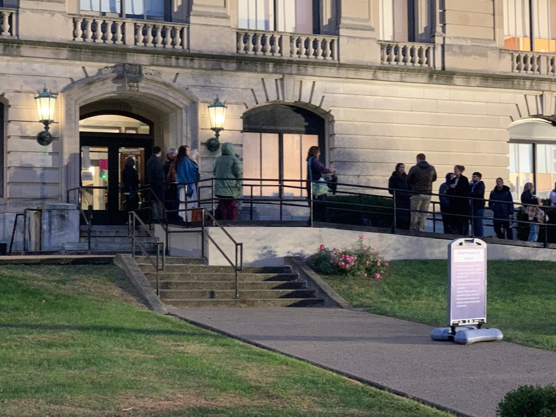 Community members and members of the media wait outside the locked doors of the Carroll County Courthouse in Delphi before the start of Day 7 of the Delphi Murders trial. (WISH Photo)