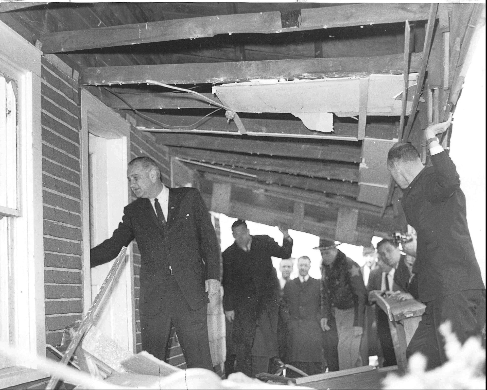 President Lyndon Johnson tours damaged buildings in Dunlap, Ind. in April 1965, following the Palm Sunday Tornado. (AP Photo/File)