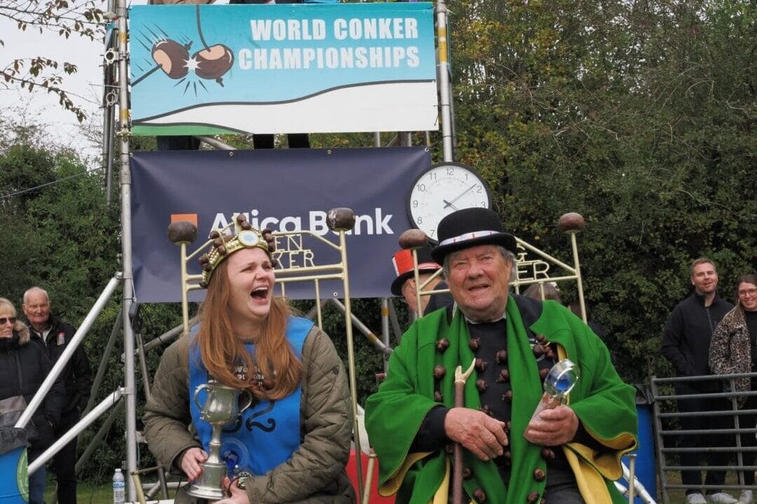 Overall champion Kelci Banschbach, of Indianapolis, and men’s champion David Jakins sit on “Queen Conker” and “King Conker” thrones after having been presented with the trophies. (Photo by David Hodson via CNN Newsource)