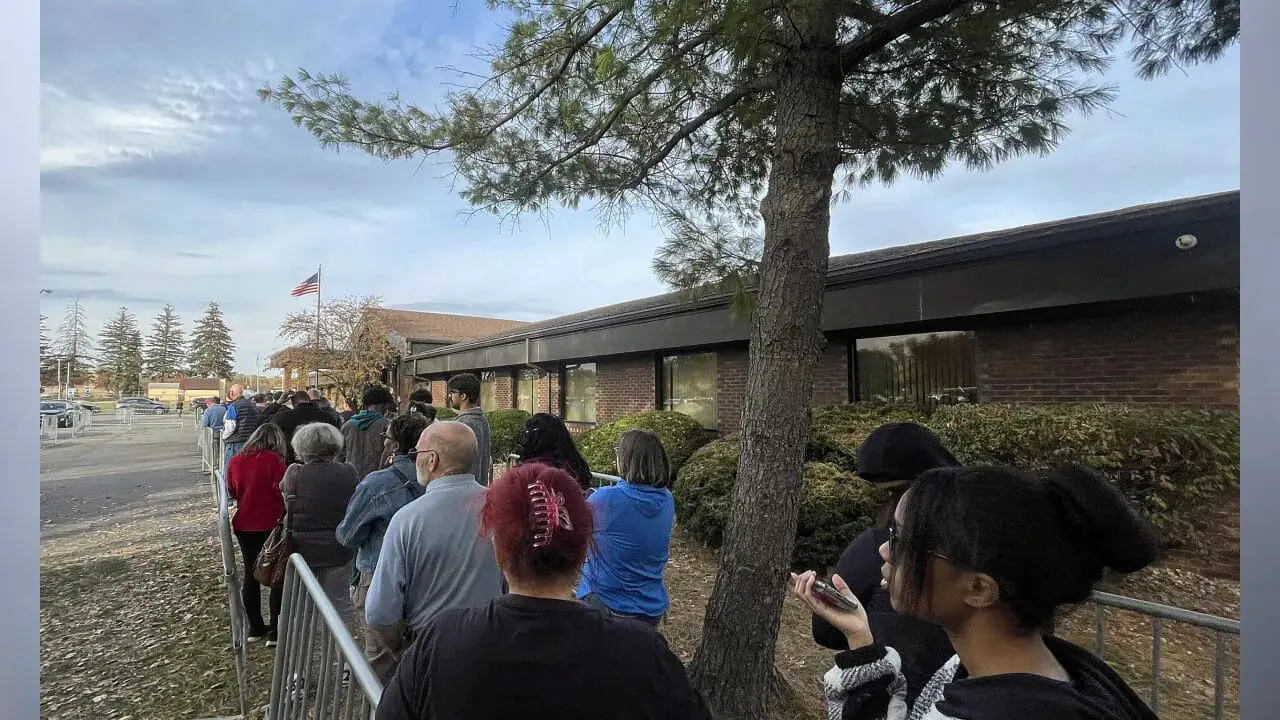 People wait in line to vote early Oct. 28, 2024, at Warren Township Government Center in Indianapolis. (Photo by Jenna Watson/Mirror Indy)