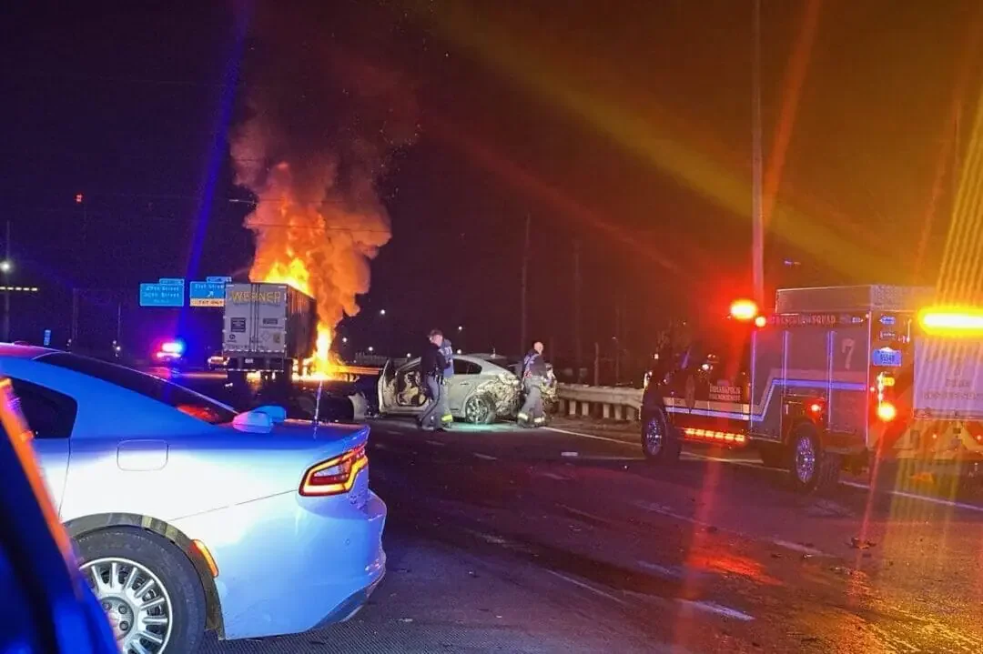 Police and firefighters at the scene of a fatal crash on northbound I-65 in downtown Indianapolis on Nov. 8, 2024. (WISH Photo)