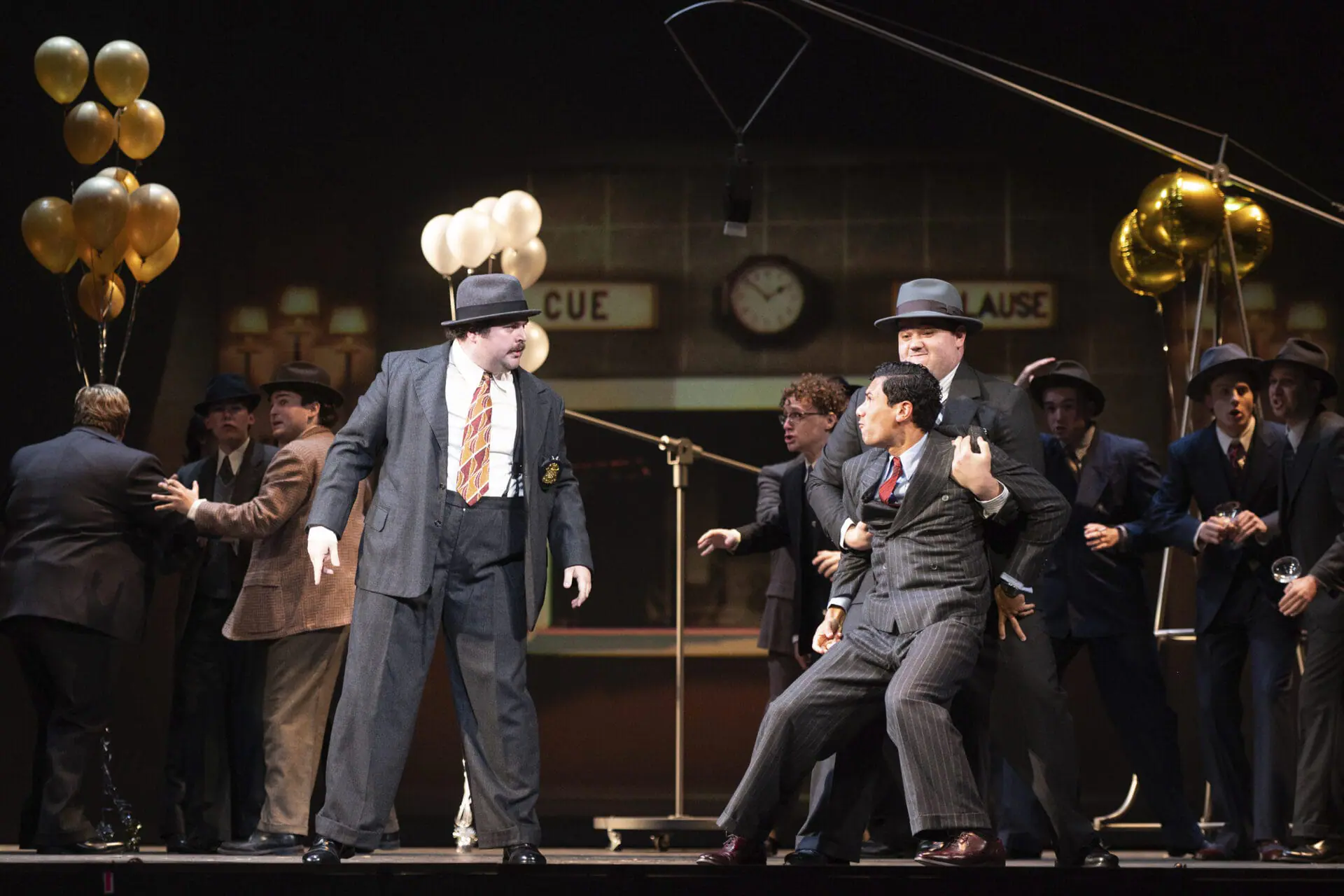 This image released by Indiana University shows, from left, Jonathan Elmore, Evan Tiapula, and Cody Home during a rehearsal of “The Amazing Adventures of Kavalier & Clay,” at the Jacobs School of Music on the Indiana University campus in Bloomington, Ind., on Monday, Nov. 11, 2024. (Sarah J. Slover/University of Indiana via AP)