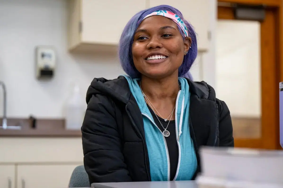 Ajia Trotter, 17, a junior, speaks with Mirror Indy on Nov. 12, 2024, at Arsenal Technical High School in Indianapolis. IPS is one of seven districts in the state participating in a new early childhood education program that places high school students in early learning centers to complete an apprenticeship. (Provided Photo/Doug McSchooler for Mirror Indy)