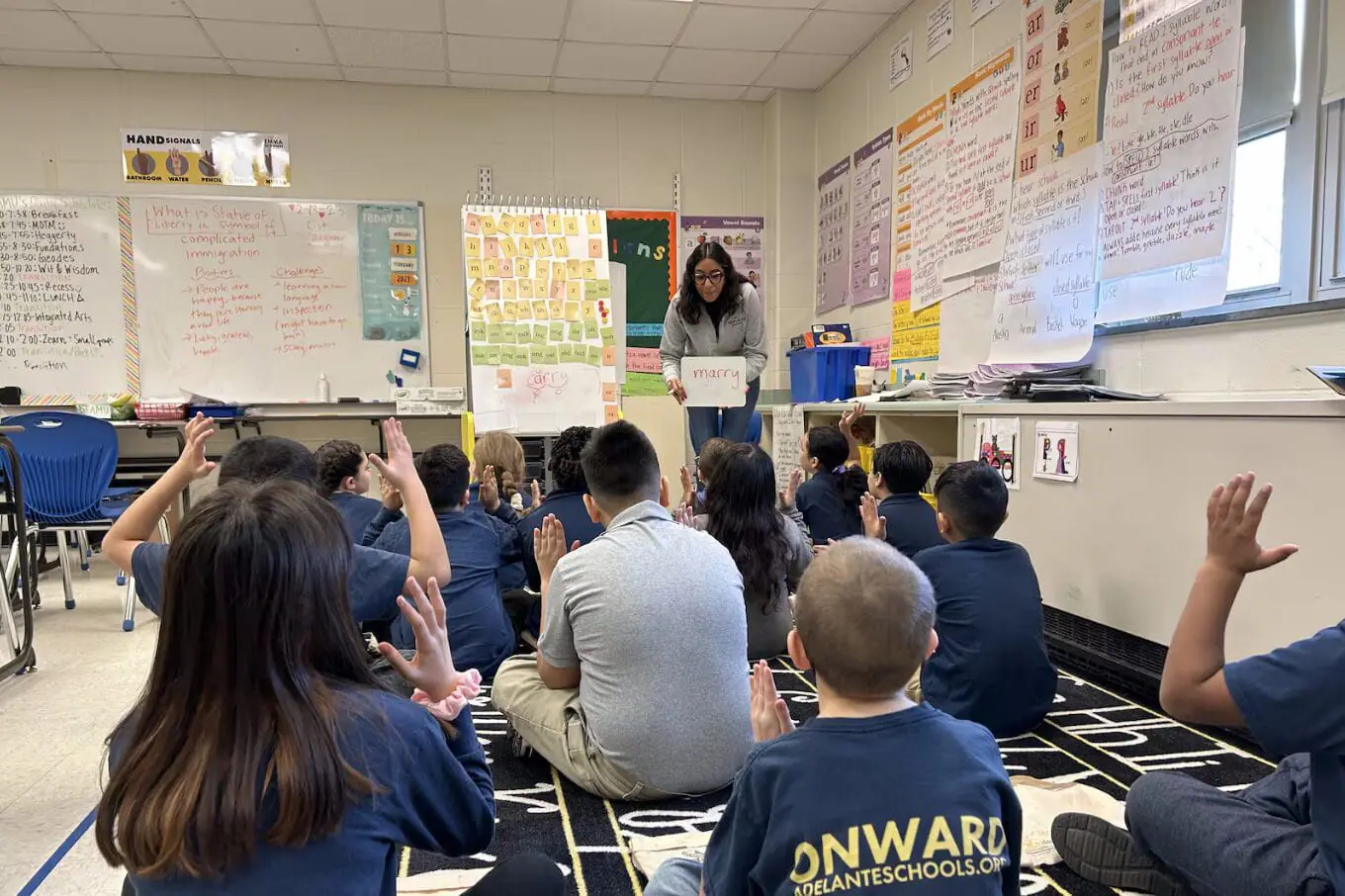 Third-grade teacher Isha Nigam reviews reading with her class at Adelante Schools on Feb. 15, 2023.