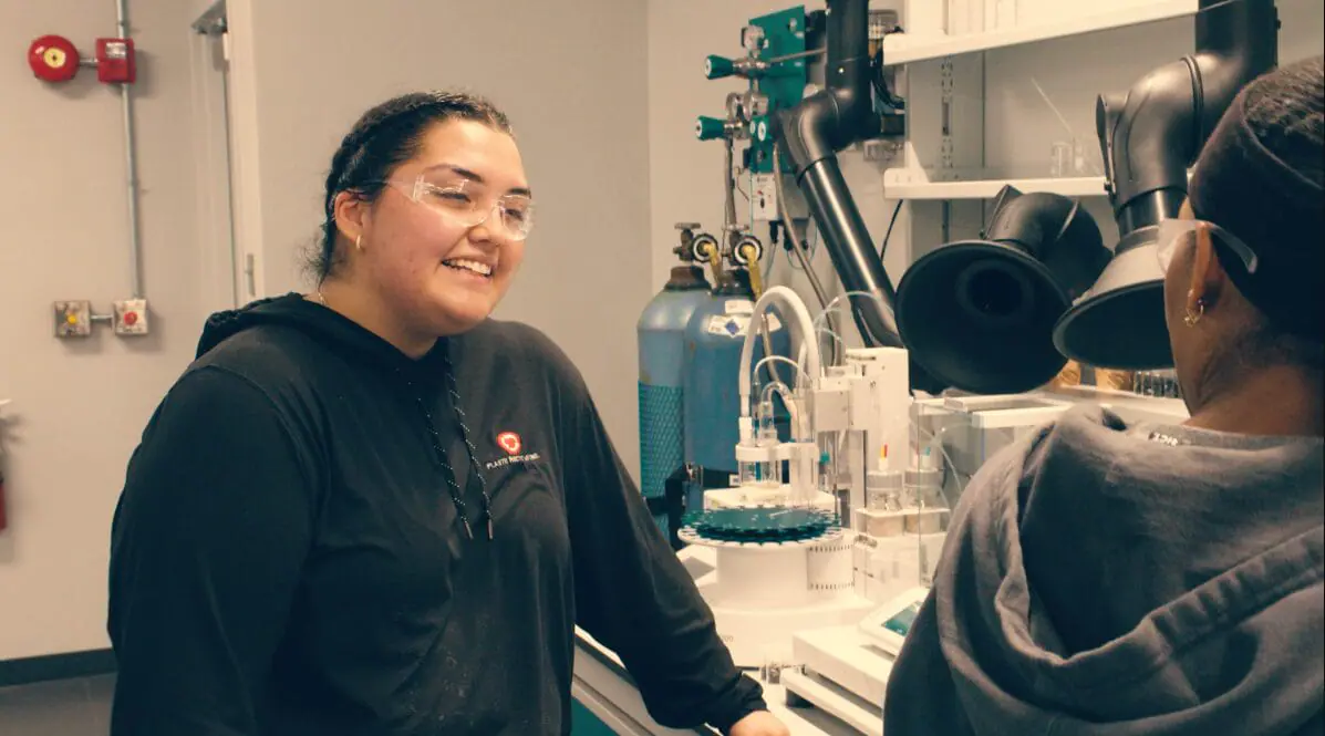 Cristina Llamas-Gonzalez checks in with other employees regularly as an apprentice with Plastic Recycling, Inc. She's continuing the apprenticeship she was placed in during high school as she begins her college studies. (Provided Photo/EmployIndy via Mirror Indy)