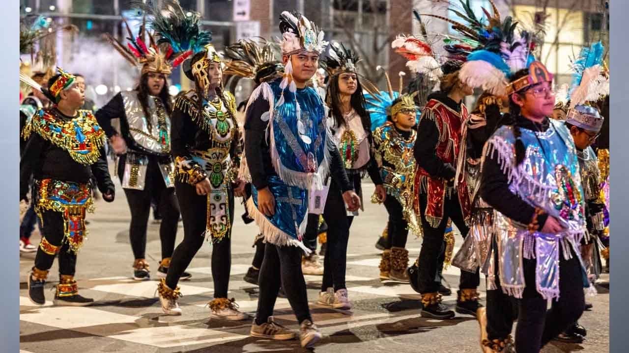 Every Dec. 11, the St. Mary’s Catholic Church congregation makes a pilgrimage from 317 N New Jersey St. to Monument Circle that includes reverberating beats of drums and mesmerizing dances resembling the traditional Indigenous dancers that paid homage to the first apparition of the Virgin of Guadalupe. The pilgrimage leads the congregation to midnight mass. (Photo Wildstyle Paschall/ Mirror Indy)